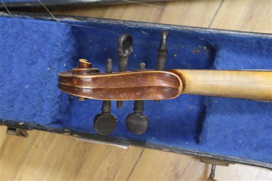 A cased violin, a bow etc